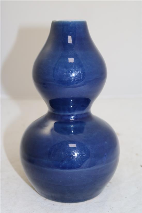 A Chinese blue monochrome double-gourd vase, Wanli six character mark and probably of the period, height 22.5cm